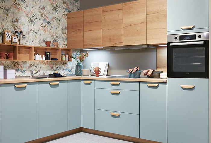 classic kitchen with natural wood cupboards and shelves
