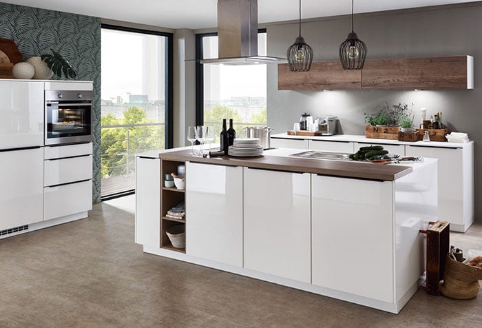 Good kitchen design can be affordable, seen here in a Alpine white high gloss finish