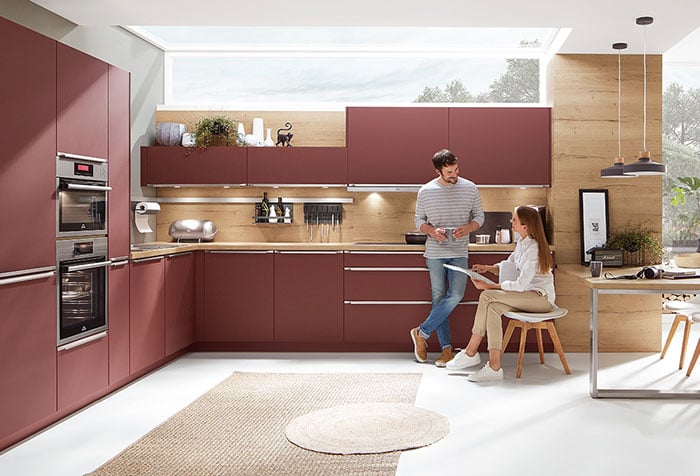 a contemporary modern kitchen with natural wood features